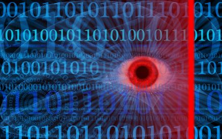 Image of Masonic-style eye on digital background of 1s and 0s